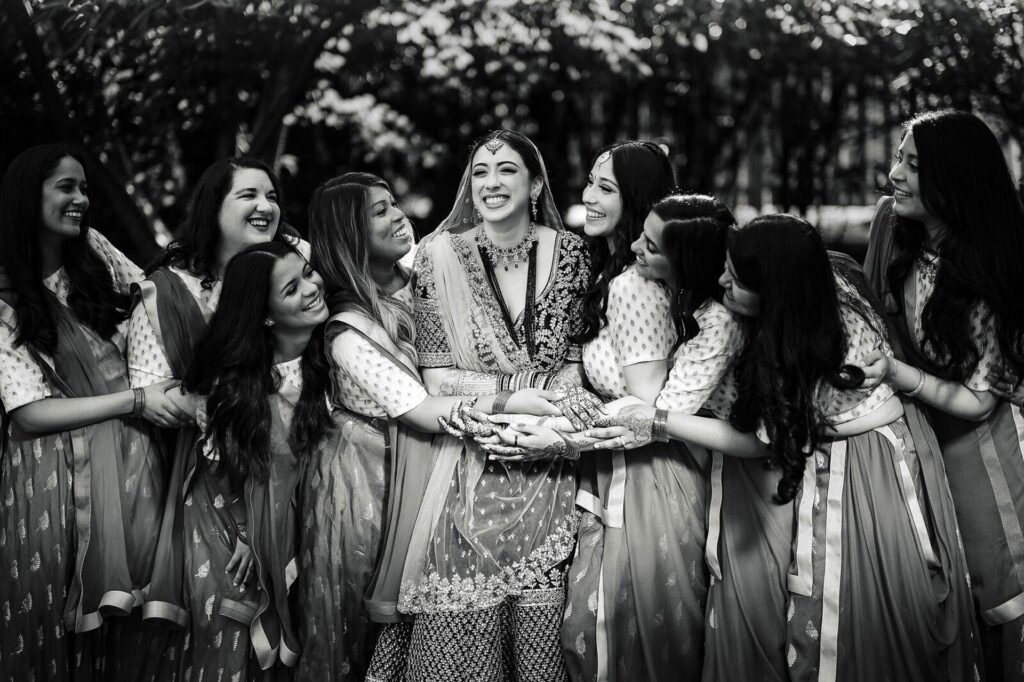 gujrati bride having fun with her bridesmaids