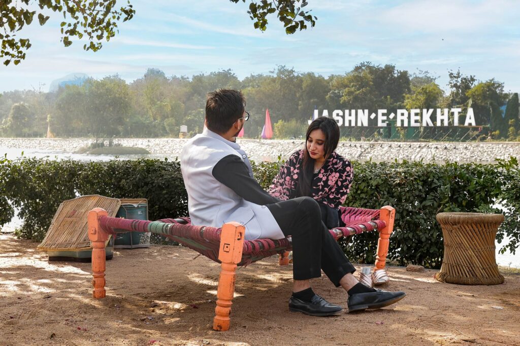 Candid photography of friends celebrating at Jashn-e-Rekhta cultural festival.