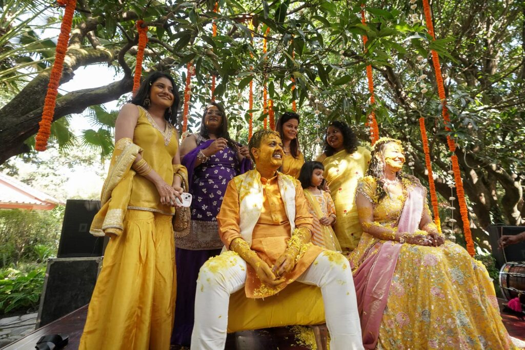 groom enjoying haldi moments with gfriends