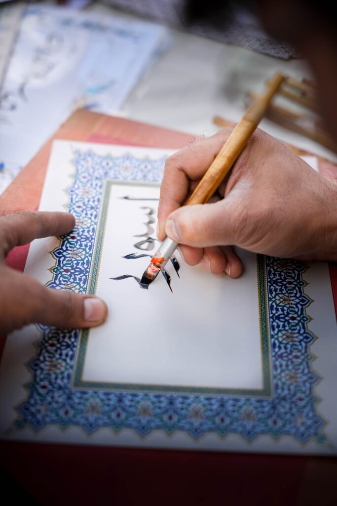 Cultural details and lifestyle photography at Delhi Urdu event.