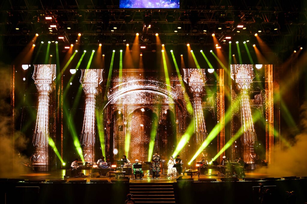 Low light professional photography of a musical performance at Jashn-e-Rekhta