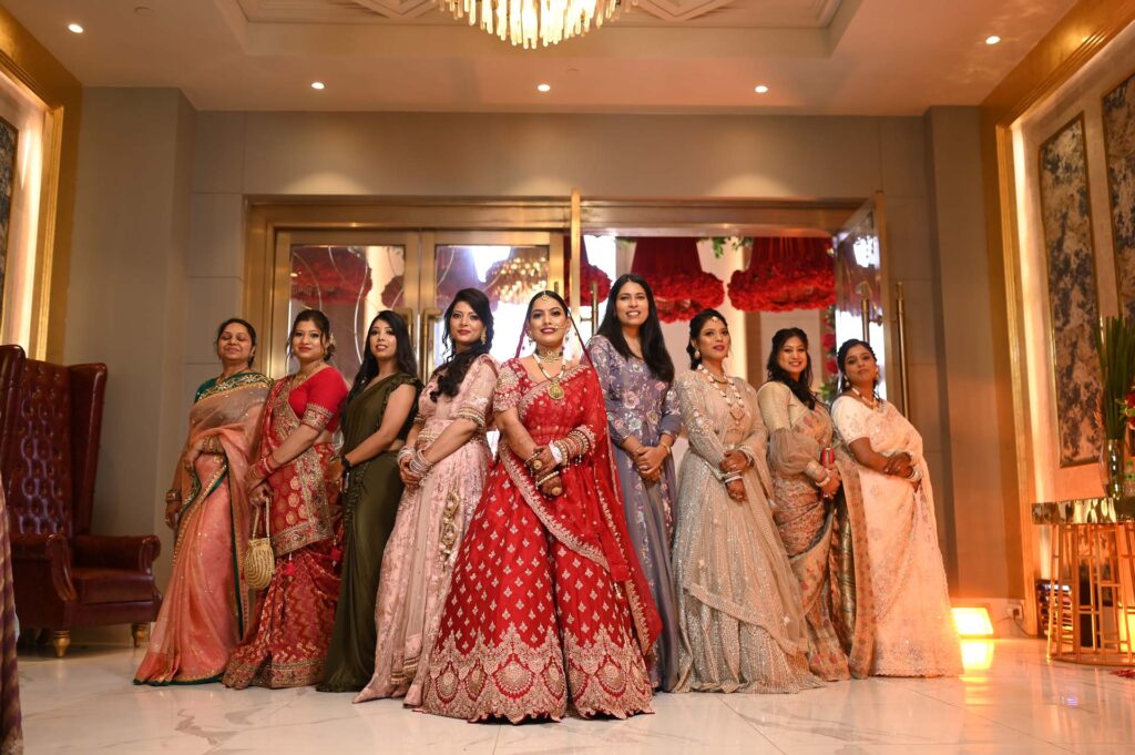 candid bride arrival moment with guests at Indian wedding Faridabad Delhi NCR