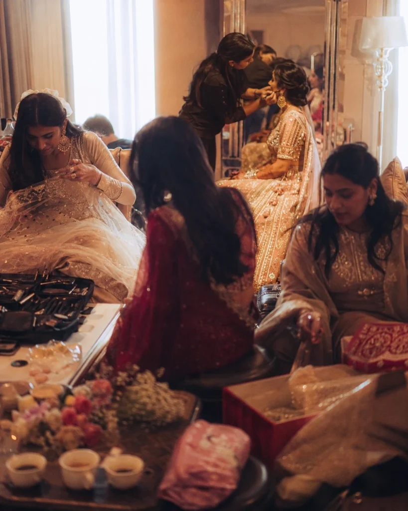 Cinematic Indian wedding preparation scene with bride, bridesmaids and emotional candid moments before the ceremony