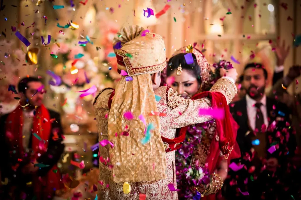 Wedding photography at Mascot Aligarh with confetti stage celebration