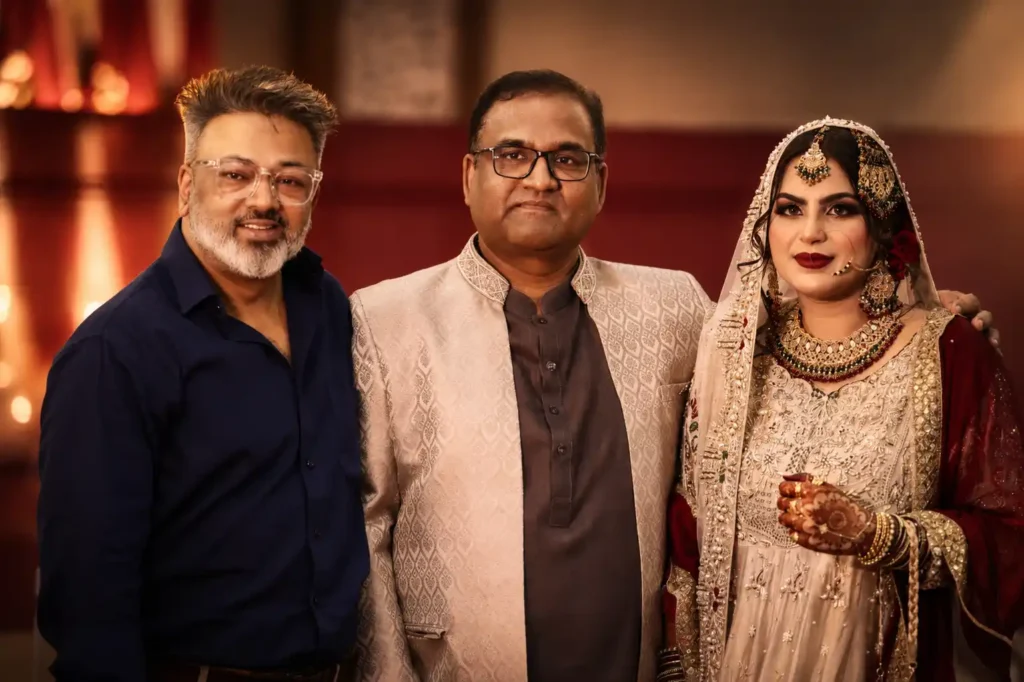Wedding photographer Asad Ansari with bride Zobia and her father during the wedding celebrations at Fort Royale, Aligarh.