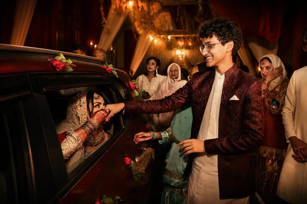 Zobia's younger brother shares an emotional farewell with Zobia as she leaves after her wedding celebrations at Fort Royal, Aligarh.