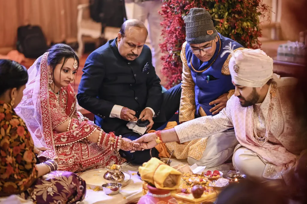 a father giving away his daughter in marriage. an emotionally charged candid moment