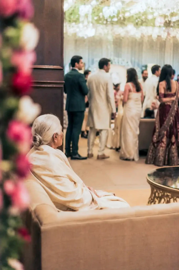 Elderly family member present during an Indian wedding celebration