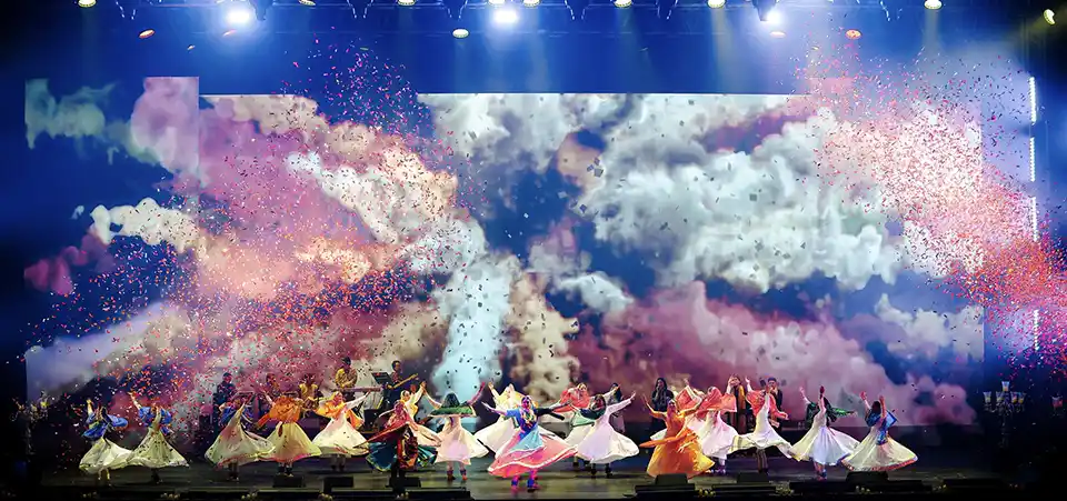 Performer on stage during Jashn-e-Rekhta cultural festival documented by official festival photographer Asad Ansari.