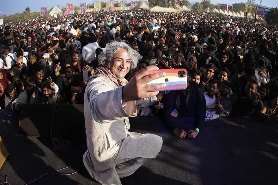 Audience members engaged during a cultural session at Jashn-e-Rekhta photographed by Asad Ansari as part of the festival's official photography coverage.