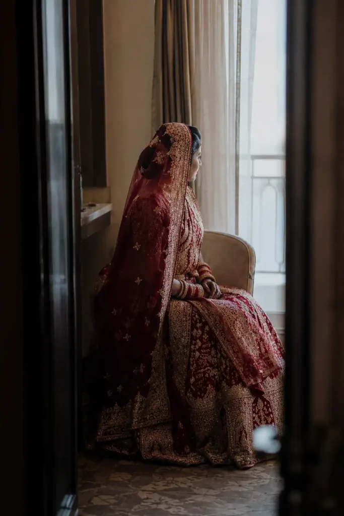 Bride sitting quietly during a brief pause on her wedding day