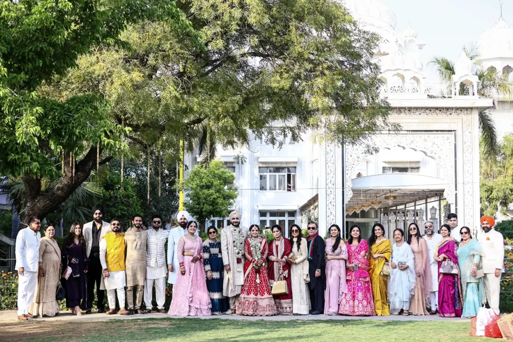 Bride and groom with family members after the Anand Karaj ceremony in New Delhi