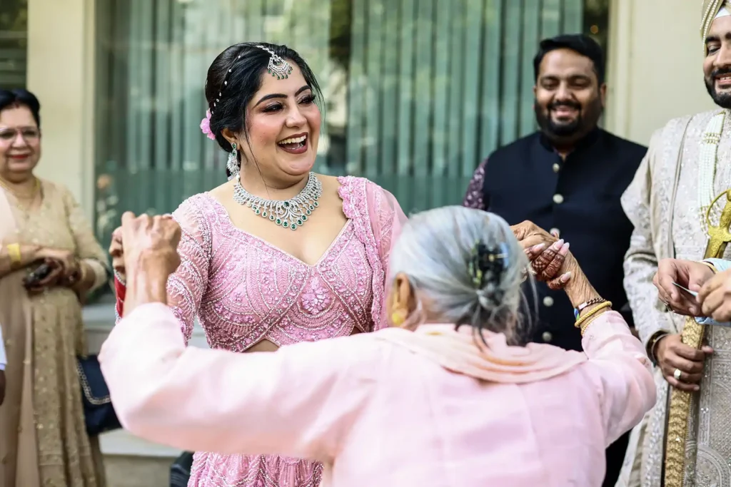 Family members celebrating during a Sikh wedding at Gurudwara Pahari Wala GK1, New Delhi