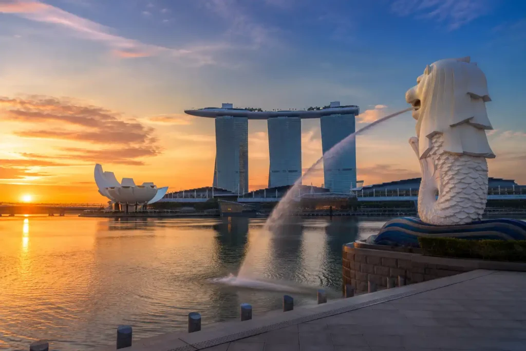 Singapore skyline at Marina Bay featuring Marina Bay Sands and the Merlion, a popular destination for luxury destination wedding photography.