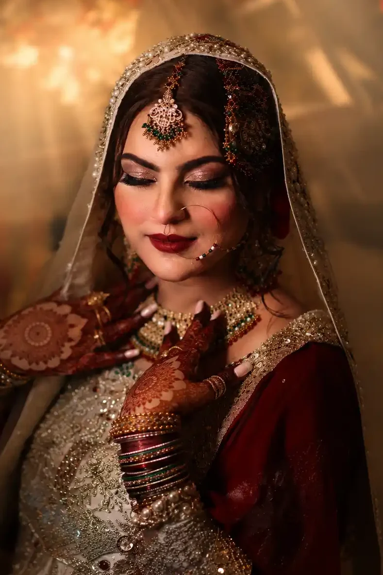 Zobia in her bridal attire during an intimate Nikah celebration at Fort Royal in Aligarh.